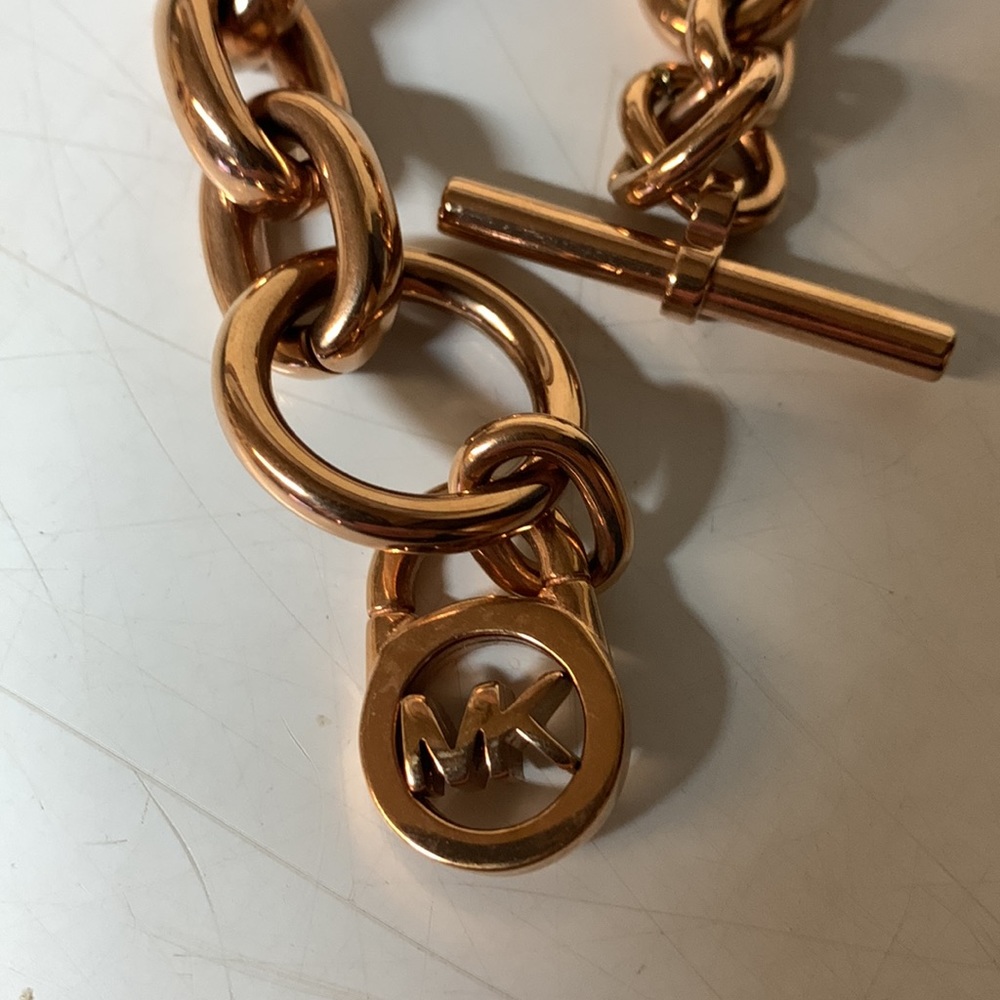 Michael Kors rose gold bracelet.